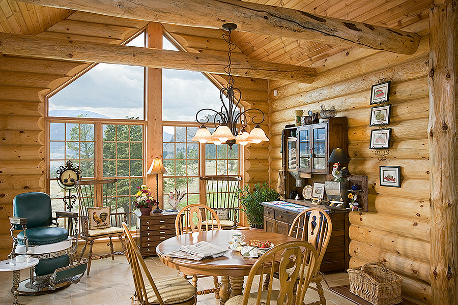 Dining room - rustic dining room idea in Milwaukee
