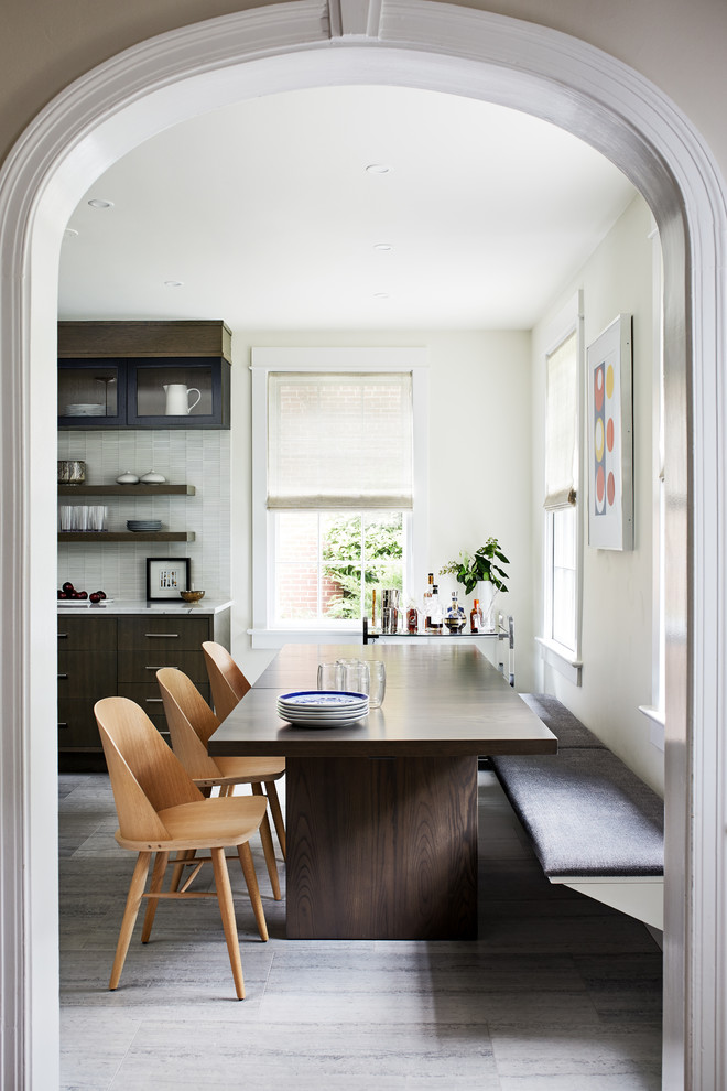 Inspiration for a contemporary kitchen/dining combo in DC Metro with limestone floors and grey floor.