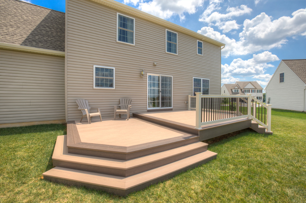 Mid-sized contemporary backyard deck in Philadelphia with no cover.