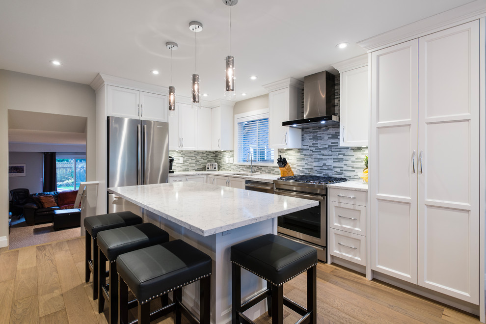 Example of a transitional kitchen design in Vancouver