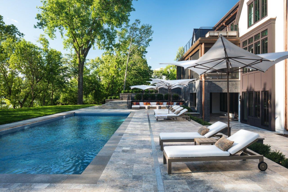 Design ideas for a contemporary backyard rectangular lap pool in Minneapolis.