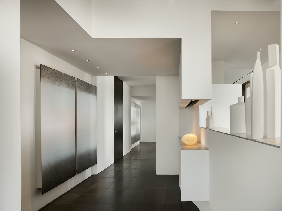 This is an example of a contemporary hallway in Philadelphia with white walls.