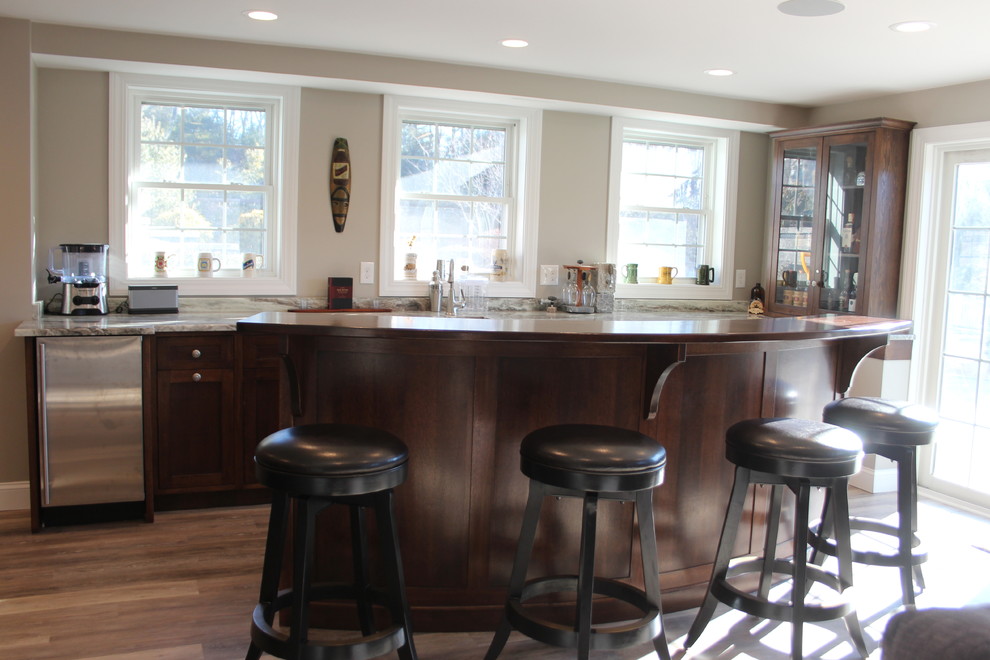 Design ideas for a transitional home bar in Boston.