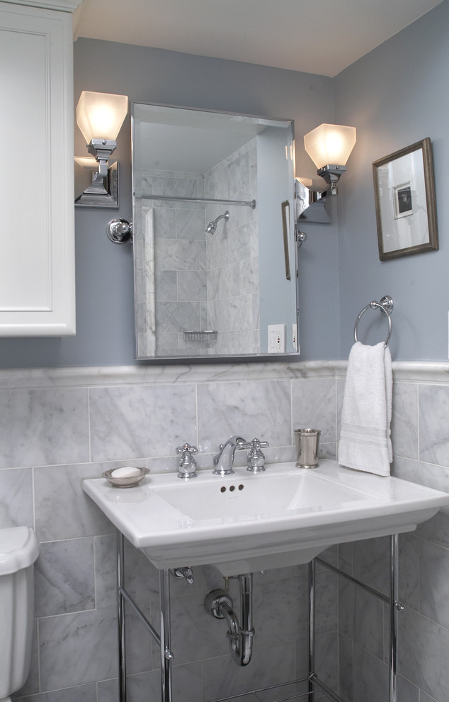 This is an example of a mid-sized contemporary 3/4 bathroom in DC Metro with a two-piece toilet, gray tile, grey walls, ceramic tile, a console sink, an alcove shower, solid surface benchtops and a shower curtain.