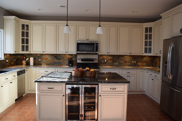 Linen Cabinets With Light Quartz Countertop And Dark Quartz