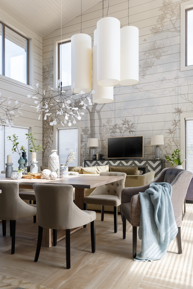 Large contemporary kitchen/dining combo in Saint Petersburg with grey walls, porcelain floors, a ribbon fireplace, a tile fireplace surround and beige floor.