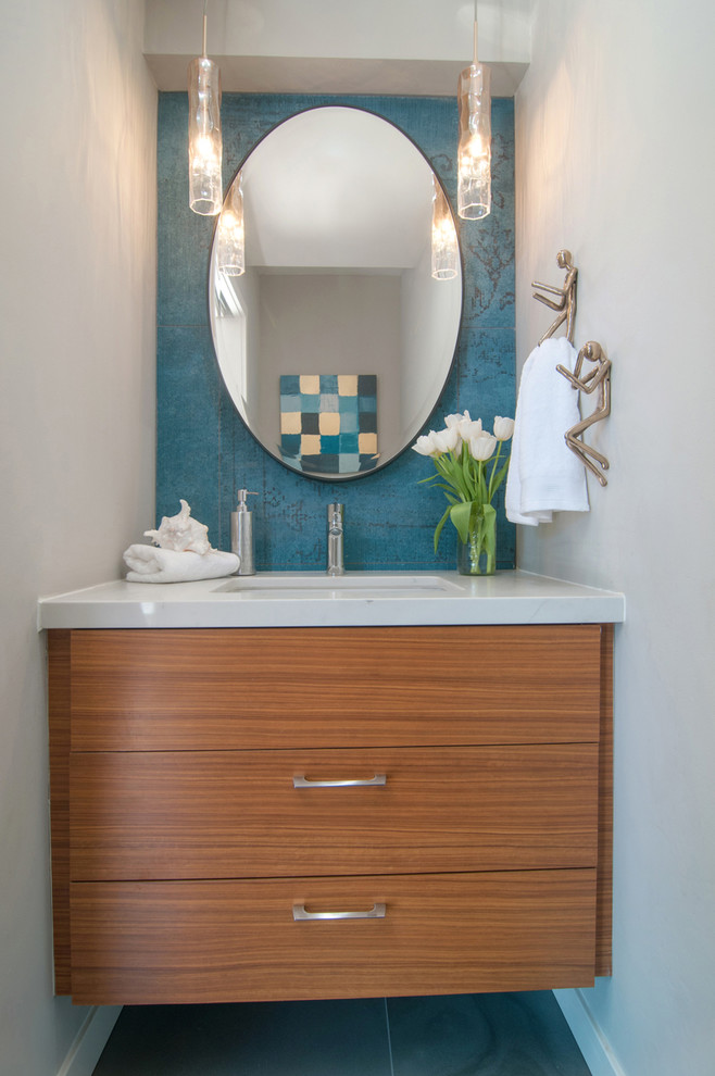 Inspiration for a midcentury powder room in San Diego.
