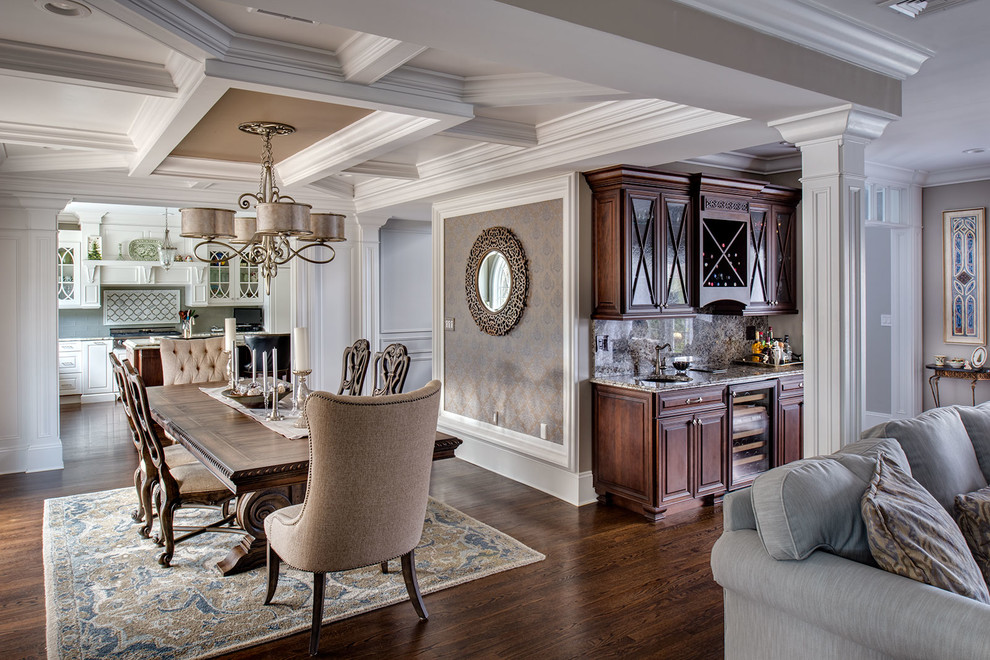 This is an example of a mid-sized transitional open plan dining in New York with grey walls, dark hardwood floors, no fireplace, brown floor, coffered and wallpaper.