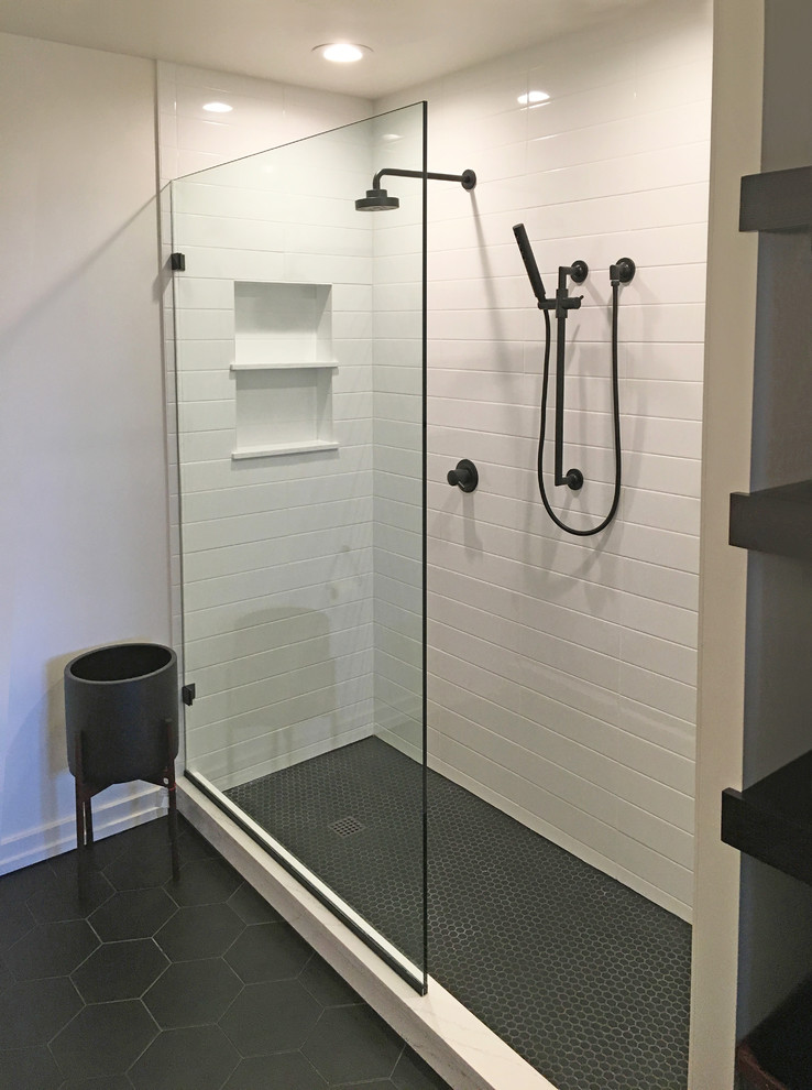 Design ideas for a mid-sized modern master bathroom in Chicago with furniture-like cabinets, dark wood cabinets, an open shower, a one-piece toilet, white tile, ceramic tile, white walls, ceramic floors, an undermount sink, quartzite benchtops, black floor and an open shower.