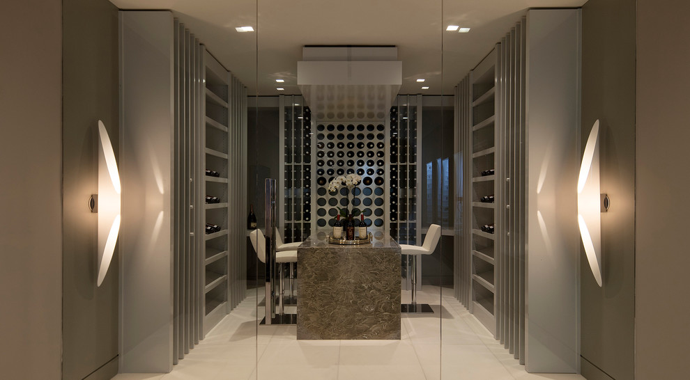 Inspiration for a contemporary wine cellar in Orange County with storage racks and white floor.