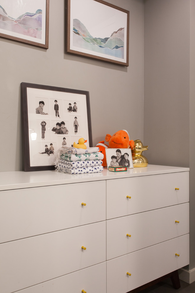 Inspiration for a small transitional kids' gray tile and porcelain tile ceramic tile and gray floor bathroom remodel with flat-panel cabinets, white cabinets, beige walls, marble countertops and an undermount sink