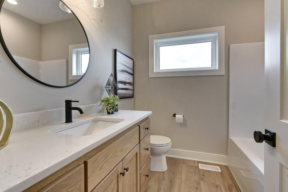 Bathroom - transitional bathroom idea with shaker cabinets, medium tone wood cabinets and a built-in vanity