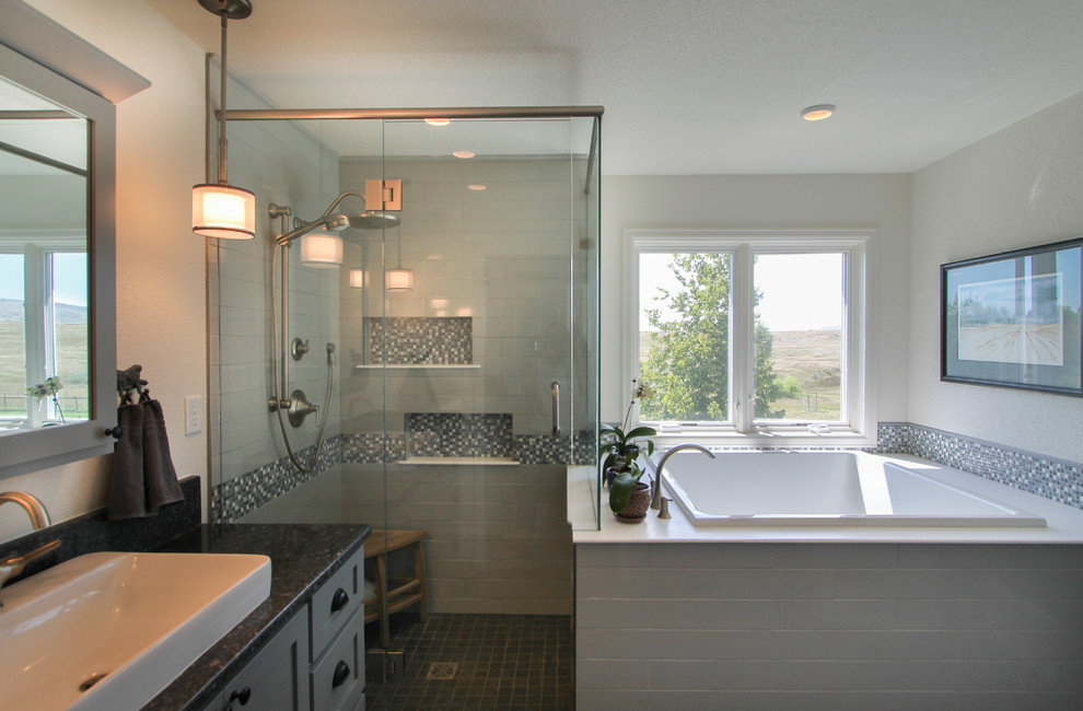 Country bathroom in Denver with a vessel sink, shaker cabinets, grey cabinets, engineered quartz benchtops, a drop-in tub, a corner shower, blue tile, ceramic tile, white walls and porcelain floors.