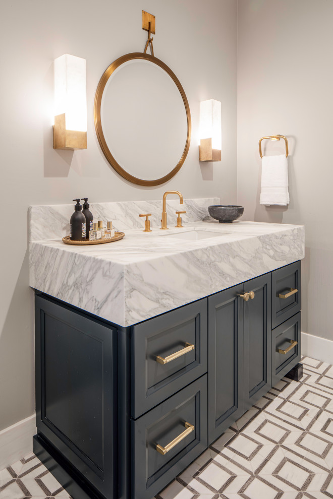 This is an example of a medium sized traditional cloakroom in San Francisco with shaker cabinets, grey cabinets, grey walls, marble flooring, a submerged sink, marble worktops, white floors, white worktops and a built in vanity unit.