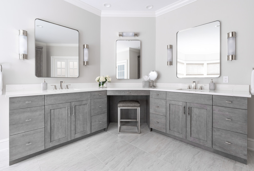 Large transitional master bathroom in Philadelphia with flat-panel cabinets, grey cabinets, grey walls, porcelain floors, an undermount sink, engineered quartz benchtops, grey floor, white benchtops, a double vanity and a built-in vanity.