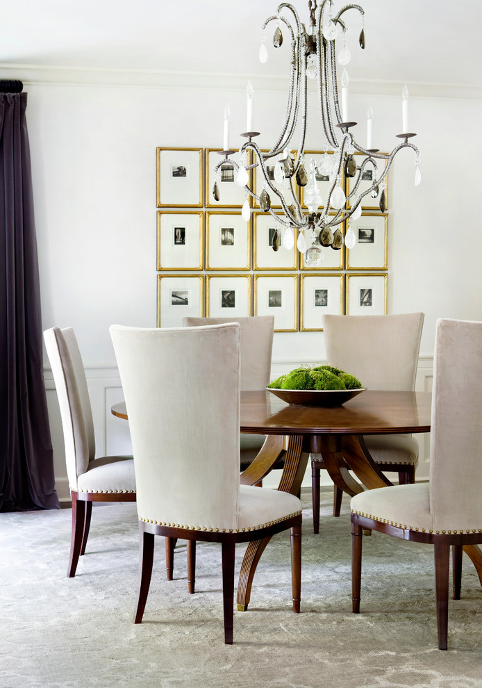 Inspiration for a transitional dining room in Atlanta with white walls.