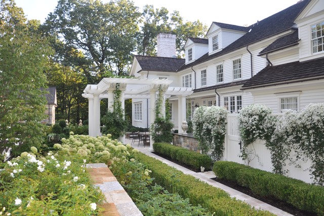 A Classic Country White Garden traditional-landscape