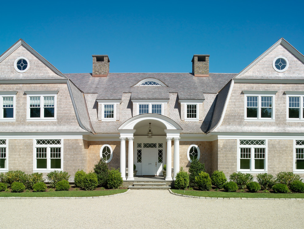 Inspiration for a large traditional exterior in Providence with a gambrel roof.
