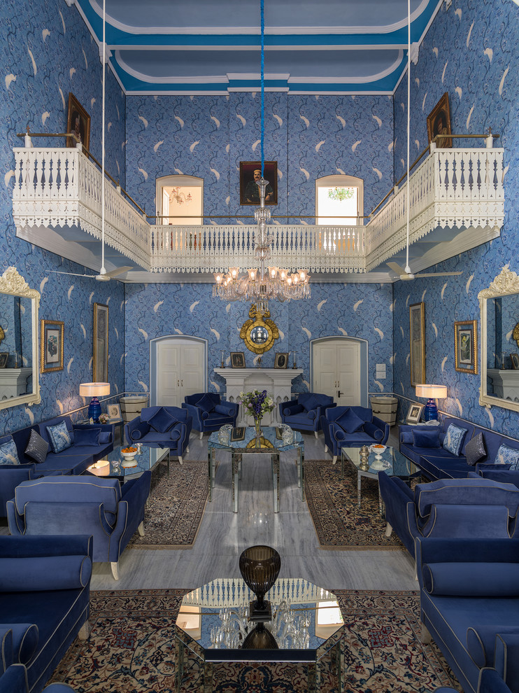 Inspiration for a Mid-sized eclectic Enclosed living room in Delhi With Blue Walls.