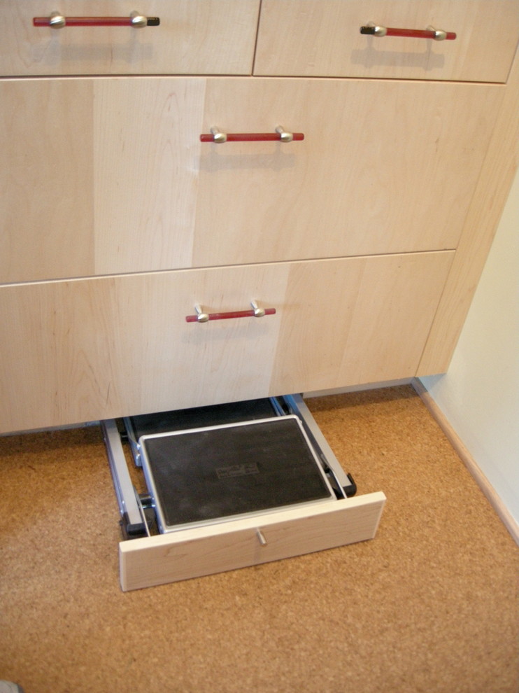 Example of a transitional cork floor eat-in kitchen design in Albuquerque with flat-panel cabinets and light wood cabinets