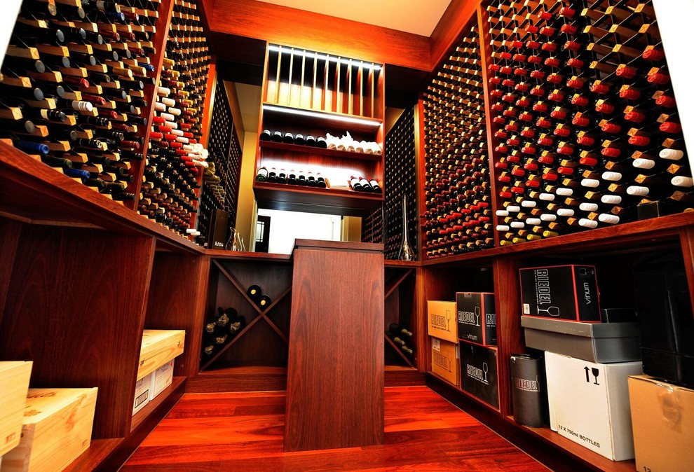 Design ideas for a mid-sized contemporary wine cellar in Adelaide with storage racks.
