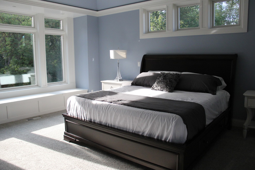 Bedroom - mid-sized guest carpeted and gray floor bedroom idea with blue walls and no fireplace