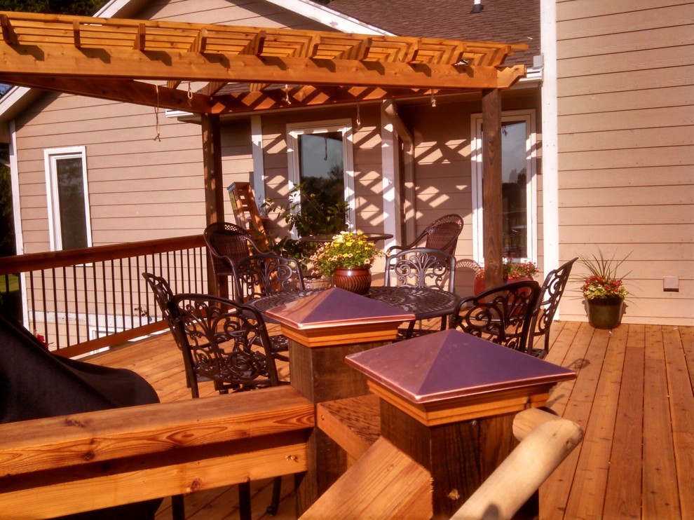 Inspiration for a craftsman rooftop balcony deck remodel with a pergola