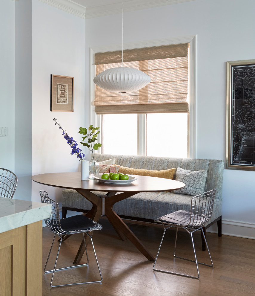 Design ideas for a transitional kitchen/dining combo in Chicago with white walls.