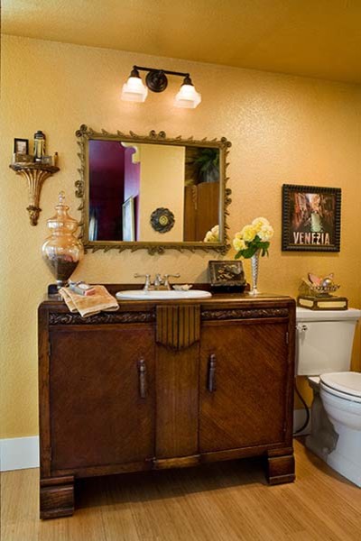 Bathroom - mid-sized traditional master bamboo floor bathroom idea in Other with furniture-like cabinets, medium tone wood cabinets, wood countertops and a two-piece toilet