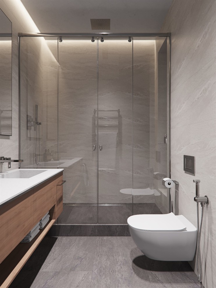 Inspiration for a large contemporary master bathroom in Saint Petersburg with flat-panel cabinets, brown cabinets, a wall-mount toilet, gray tile, porcelain tile, grey walls, porcelain floors, an undermount sink, solid surface benchtops, white floor and white benchtops.