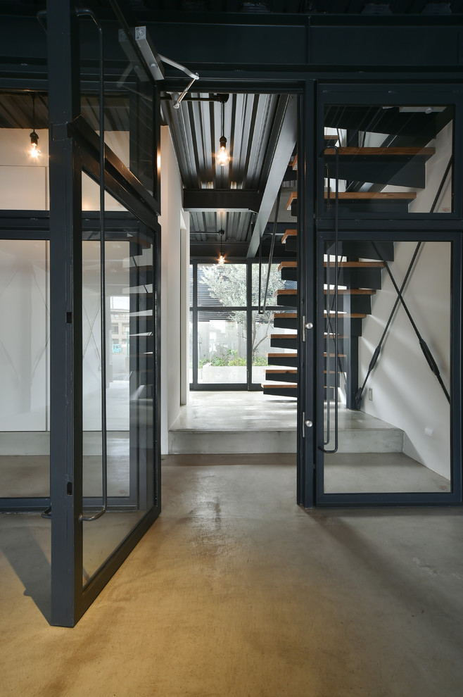 Stoic Smile Industrial Entry Nagoya by ica associates inc.
