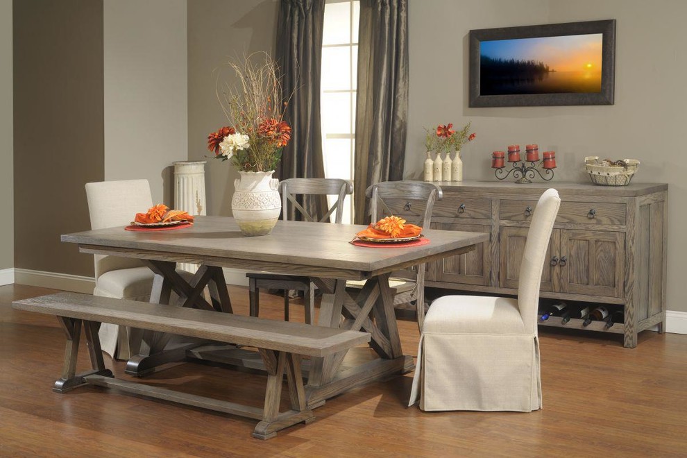 Photo of a mid-sized country dining room in Chicago with grey walls, medium hardwood floors and brown floor.