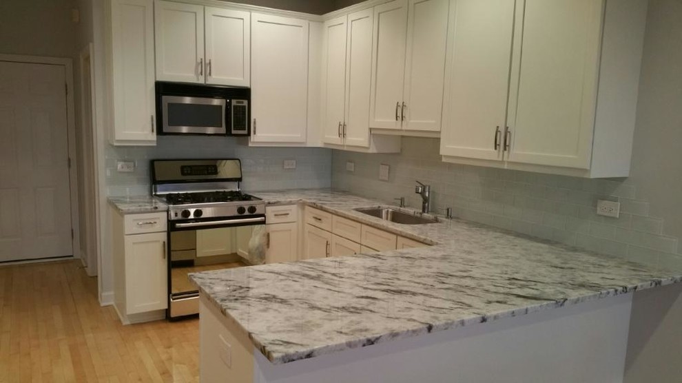 Kitchen photo in Chicago with granite countertops
