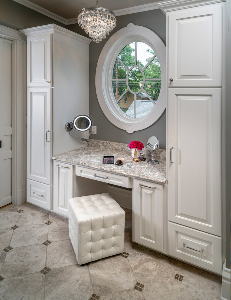 Photo of a large traditional master bathroom in Other with raised-panel cabinets, white cabinets, a claw-foot tub, a double shower, a two-piece toilet, gray tile, porcelain tile, grey walls, porcelain floors, a drop-in sink, quartzite benchtops, grey floor, a sliding shower screen and grey benchtops.