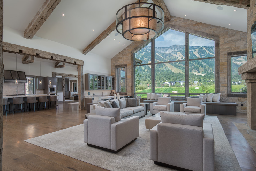 Inspiration for a country open concept living room in Other with white walls, brown floor and medium hardwood floors.