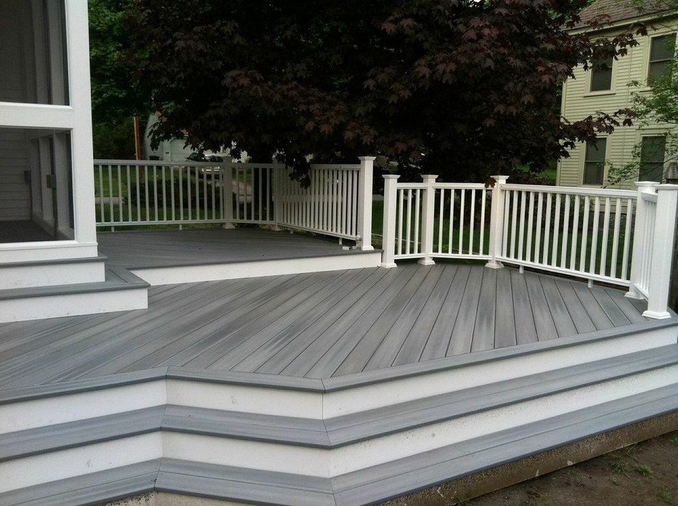 Mid-sized traditional backyard deck in Boston with no cover.