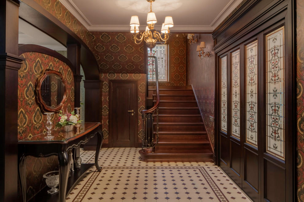 Mid-sized traditional foyer in Moscow with brown walls and green floor.