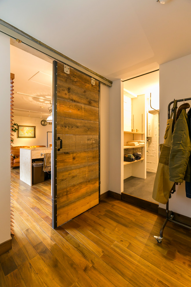 Design ideas for an industrial storage and wardrobe in Other.