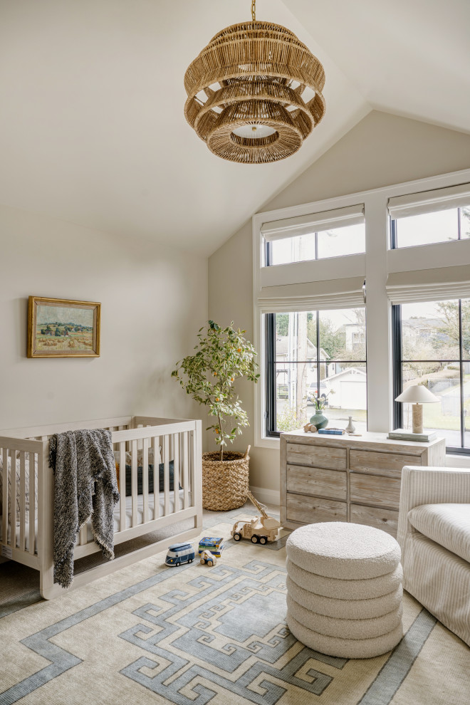 Kirkland New Construction - Example of a transitional gender-neutral light wood floor, beige floor and vaulted ceiling nursery design in Seattle with beige walls