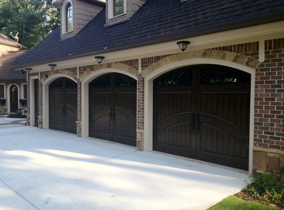 Large traditional attached three-car garage in Atlanta.