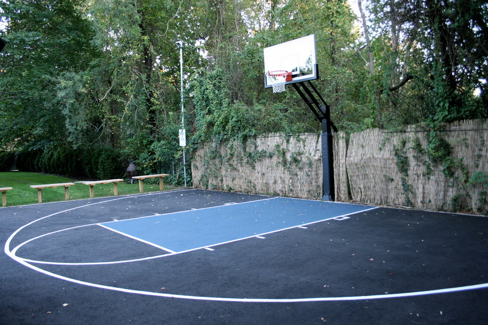 Large traditional backyard partial sun outdoor sport court in New York with decomposed granite.