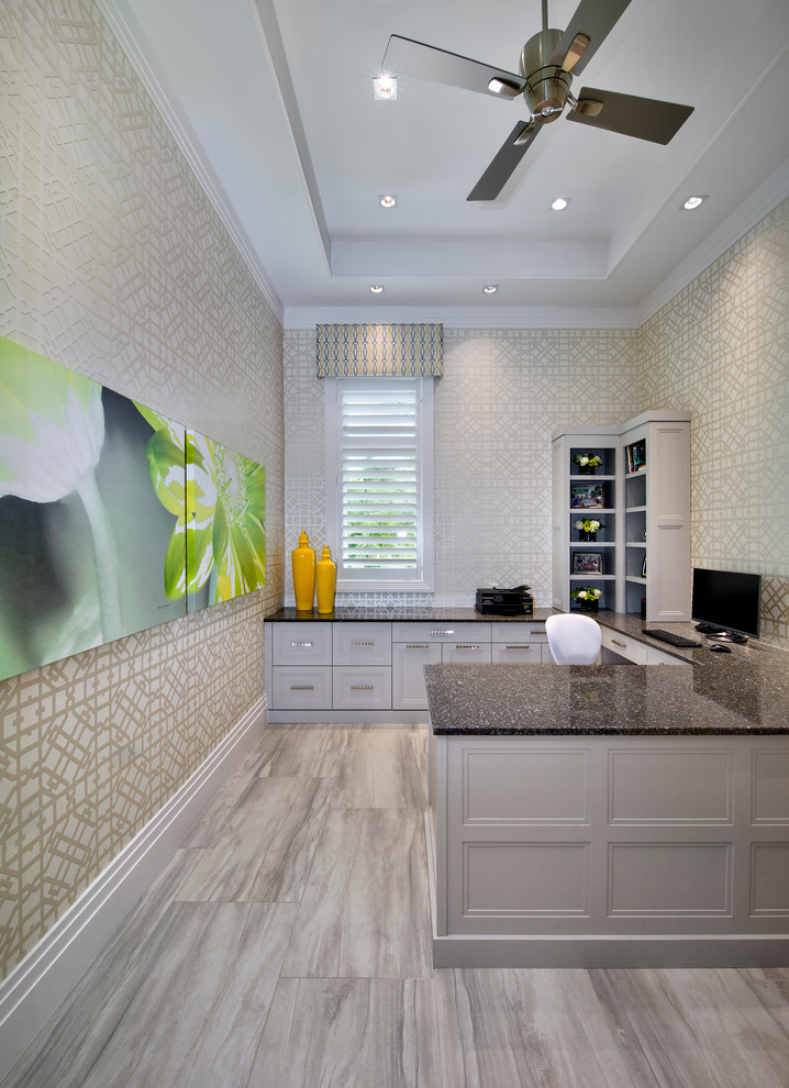 Design ideas for a mid-sized transitional home office in Miami with beige walls and a built-in desk.