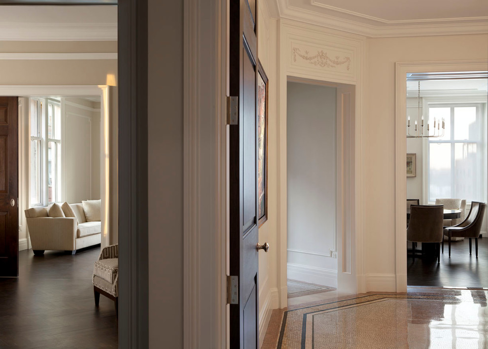 Inspiration for a large traditional hallway in New York with white walls.