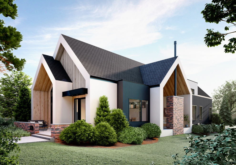 Стильный дизайн: двухэтажный, белый частный загородный дом среднего размера в скандинавском стиле с комбинированной облицовкой, двускатной крышей, крышей из гибкой черепицы, черной крышей и отделкой планкеном - последний тренд