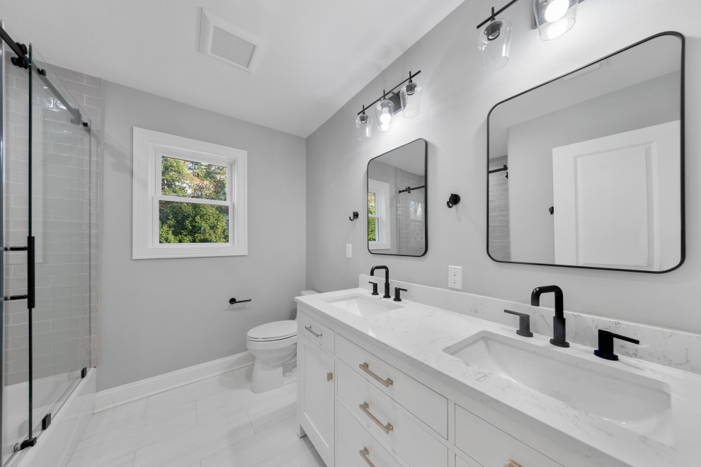 Bathroom with Black Fixtures and Double Vanity