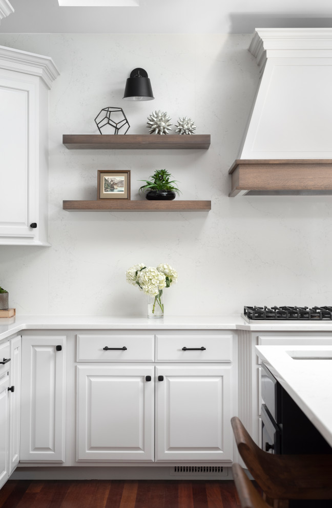 Eat-in kitchen - large transitional u-shaped medium tone wood floor and vaulted ceiling eat-in kitchen idea in Chicago with a farmhouse sink, raised-panel cabinets, gray cabinets, quartz countertops, white backsplash, quartz backsplash, stainless steel appliances, an island and white countertops