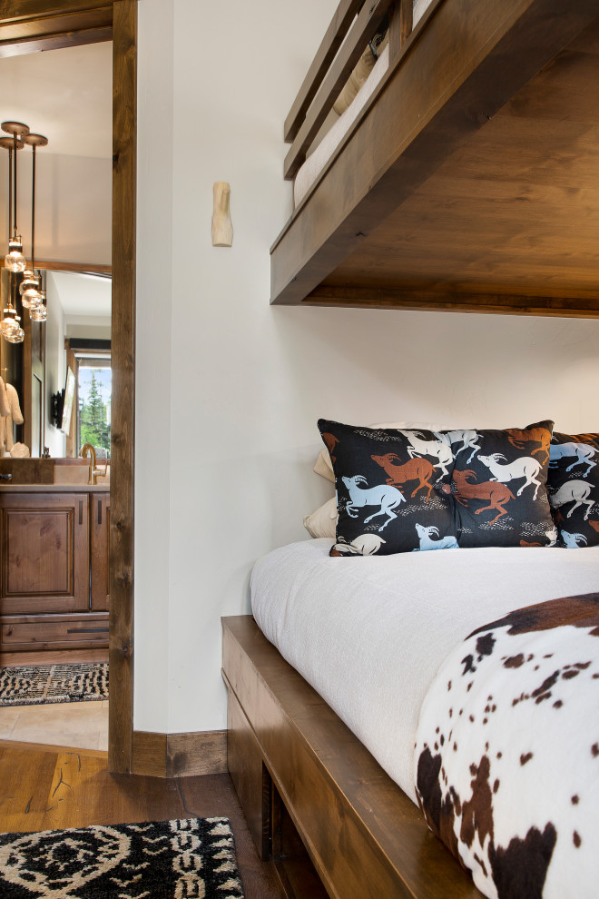 Inspiration for a rustic bedroom remodel in Denver
