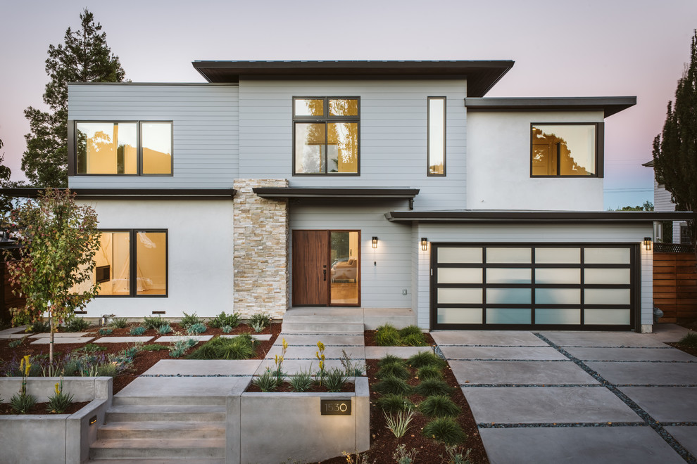 Contemporary two-storey grey house exterior in San Francisco with mixed siding and a metal roof.