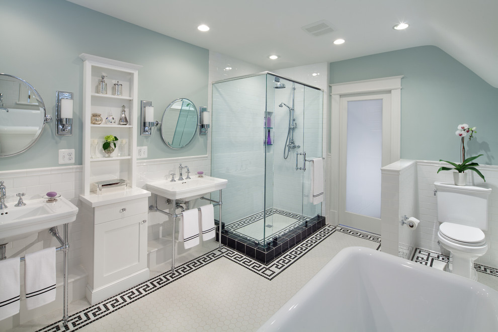 Design ideas for a mid-sized arts and crafts master bathroom in DC Metro with a console sink, recessed-panel cabinets, white cabinets, a freestanding tub, a corner shower, a two-piece toilet, multi-coloured tile, mosaic tile, green walls and marble floors.