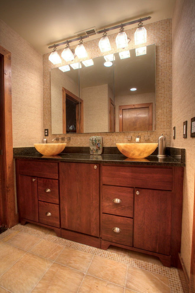 Large asian master bathroom in Bridgeport with a vessel sink, flat-panel cabinets, dark wood cabinets, granite benchtops, a drop-in tub, a double shower, a two-piece toilet, yellow tile, stone tile, yellow walls and mosaic tile floors.